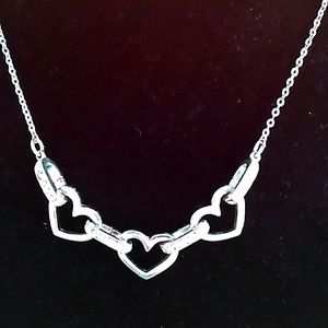 Oggie design 7 inch, 3 inch silver drop heart necklace.